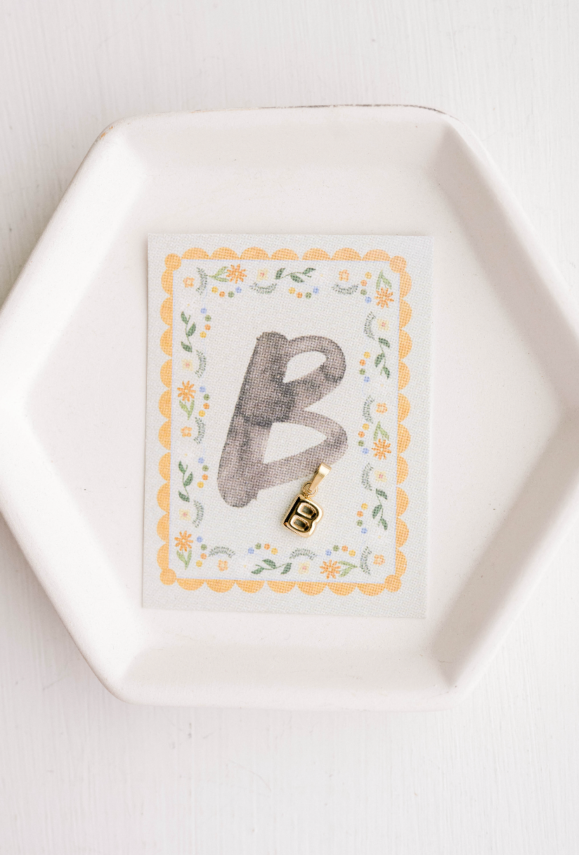 B - Letter Charm