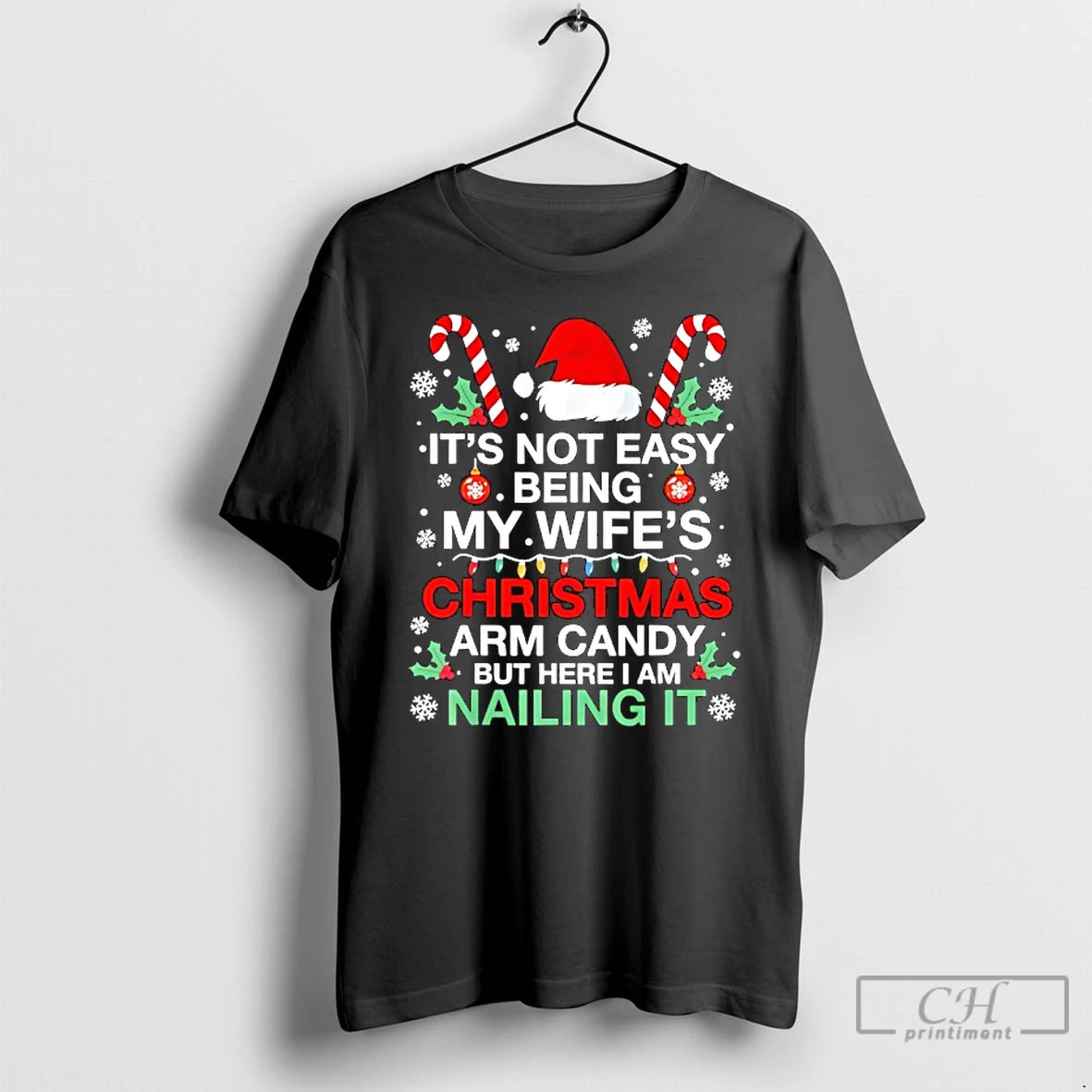 Classic Christmas Its Not Easy Being My Wifes Arm Candy Xmas T-Shirts, Hoodie, Sweatshirt | InkRitualCo.com