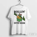 Classic Funny Raccoon Feral Rollin Into 2026 Christmas Happy New Year T-Shirts, Hoodie, Sweatshirt | InkRitualCo.com
