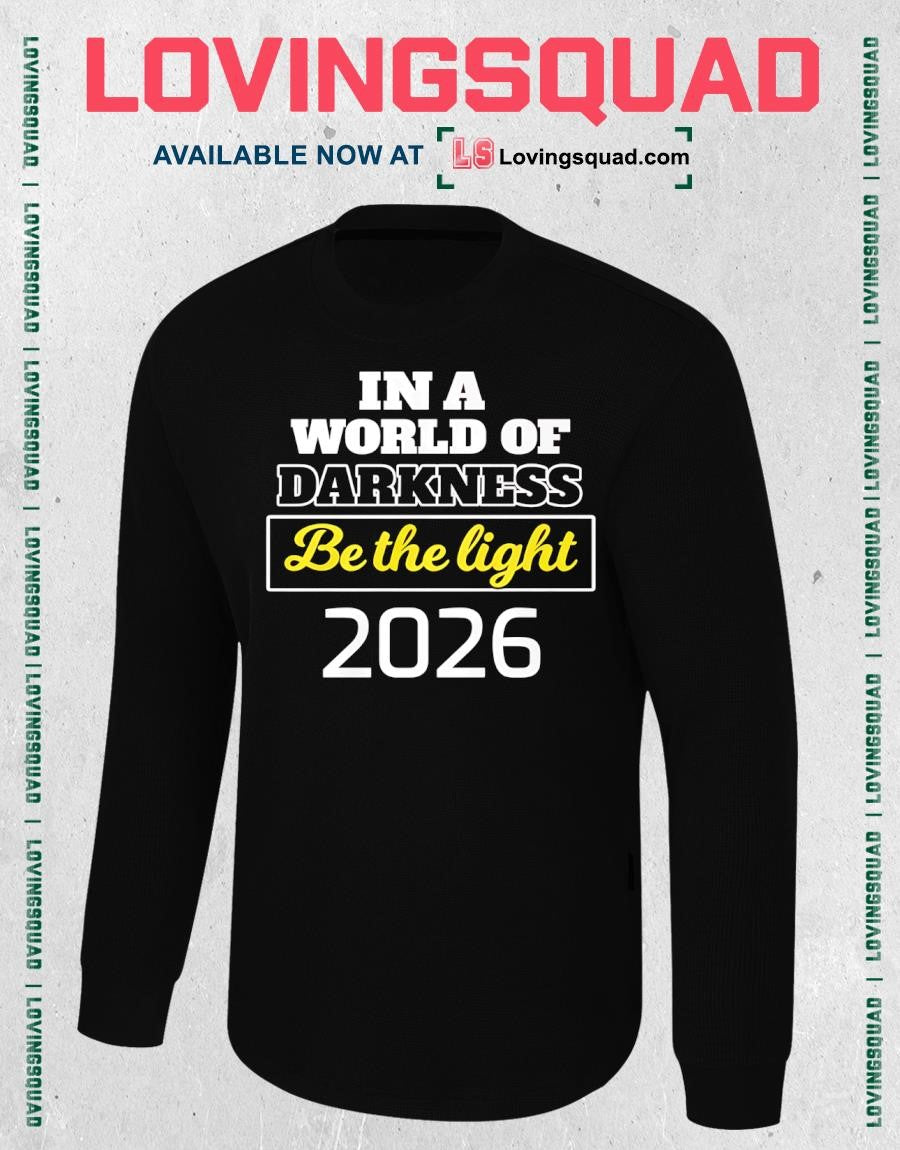 In A World of Darkness Be The Light T-Shirt