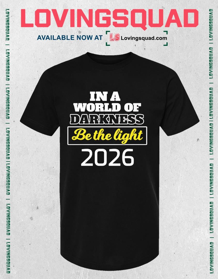 In A World of Darkness Be The Light T-Shirt
