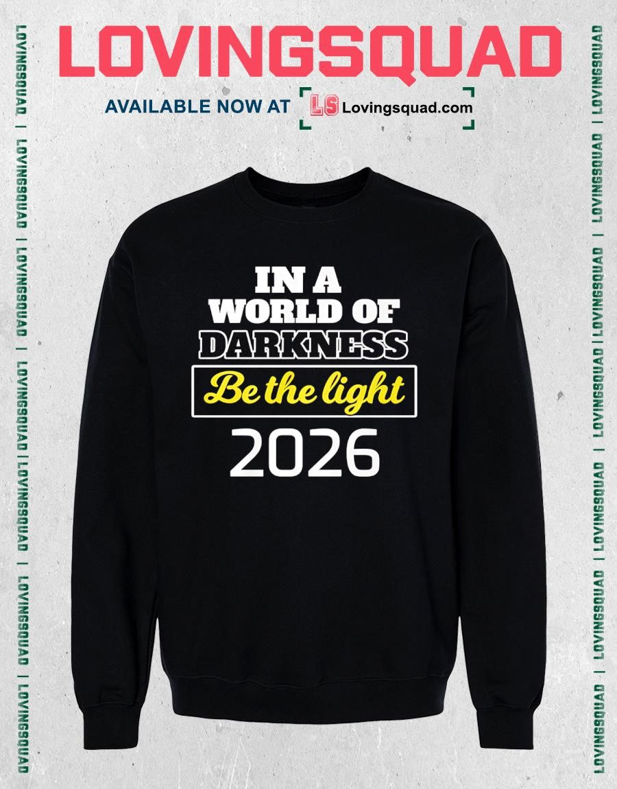 In A World of Darkness Be The Light T-Shirt