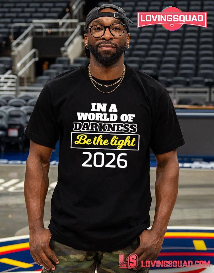 In A World of Darkness Be The Light T-Shirt