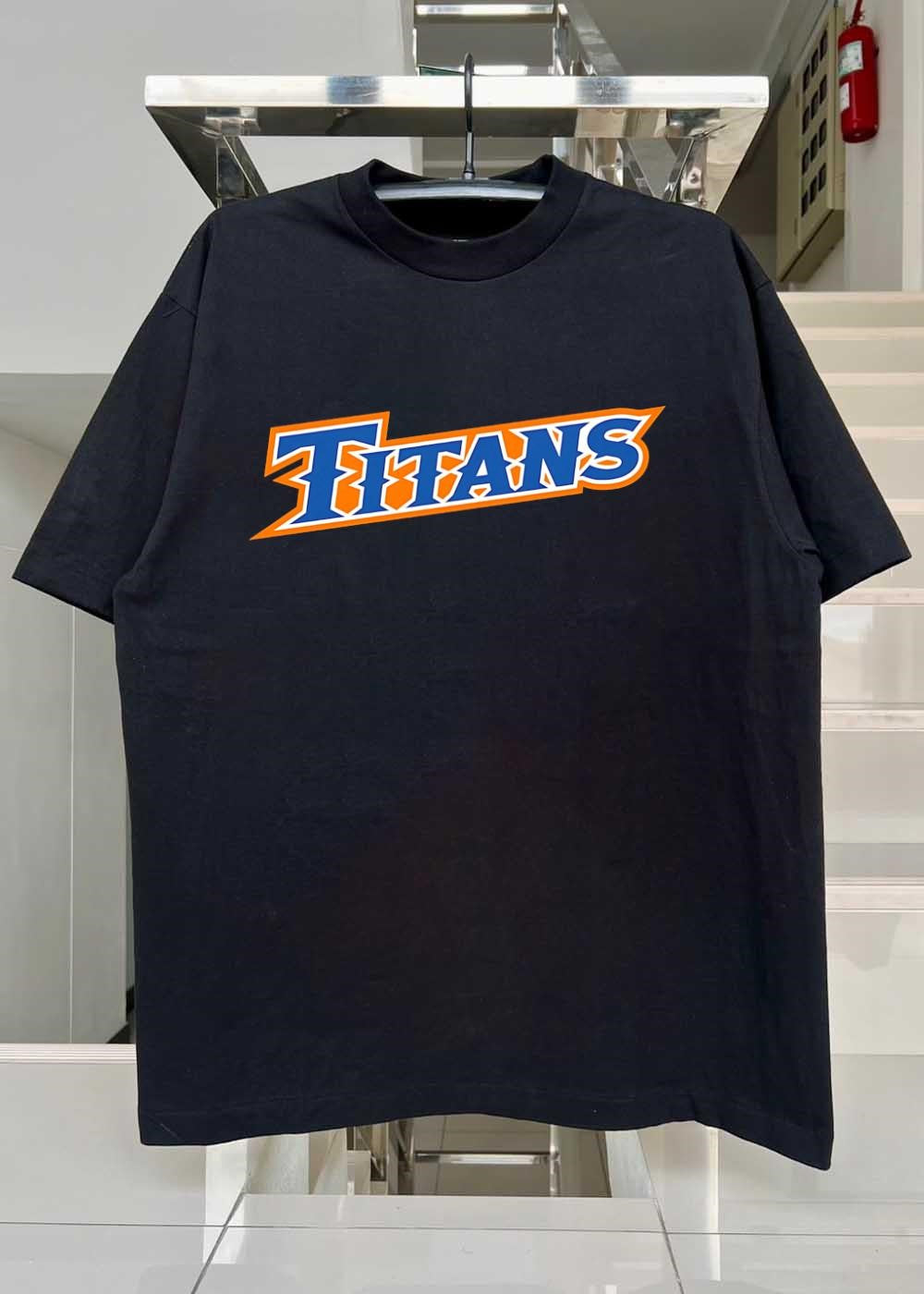 Team Apparel ‘ Shop Titans Lettered Logo shirt