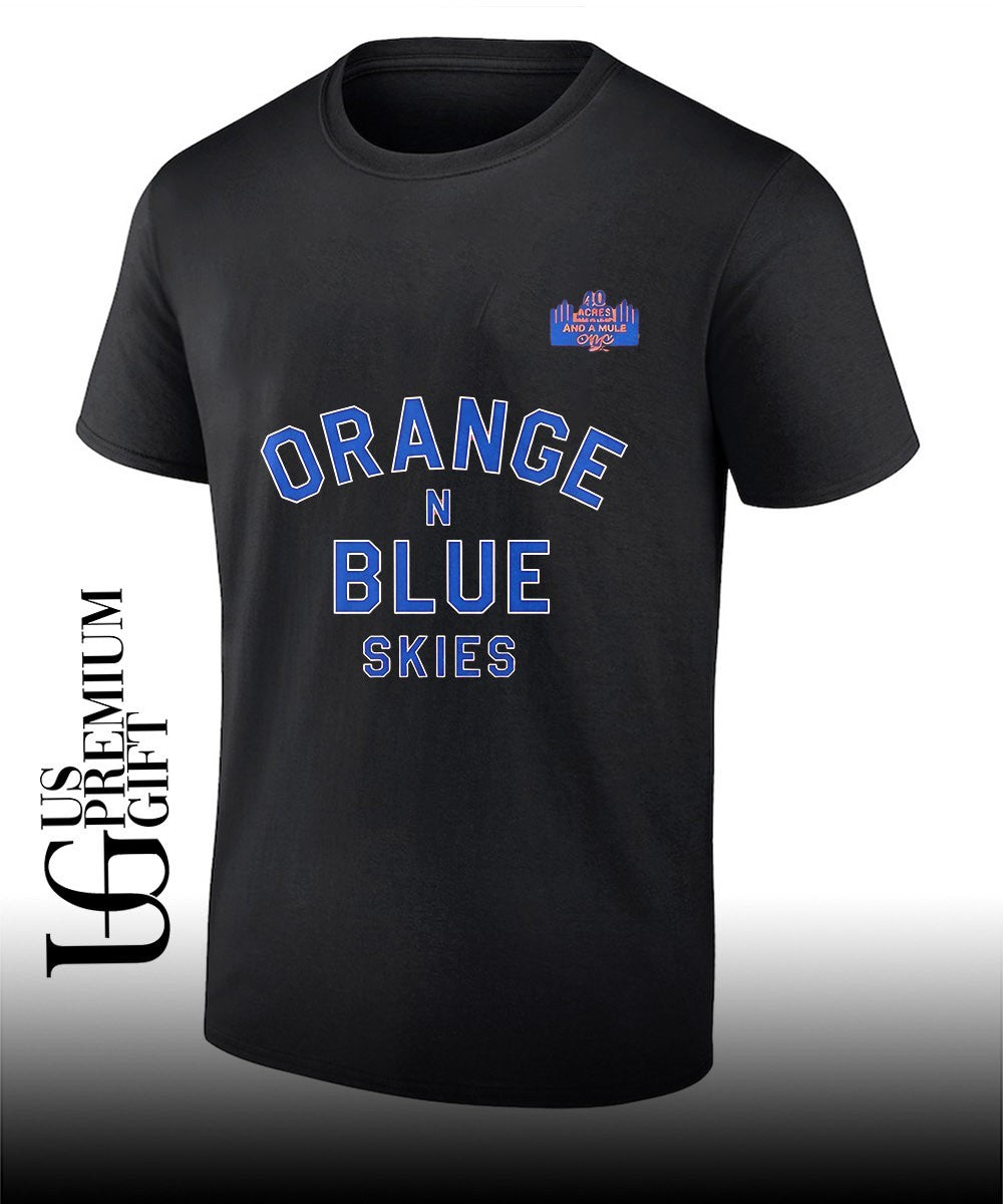 Spike Lee wearing Orange and Blue Skies 2026 Knicks Game 4 shirt
