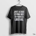 Top Just A Dad Trying Not To Raise A Liberal Vintage T Shirt Sweater Hoodie, Sweatshirt | InkRitualCo.com