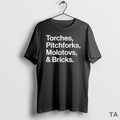 Top Torches Pitchforks Molotovs And Bricks 2025 World Tour T Shirt Sweater Hoodie, Sweatshirt | InkRitualCo.com