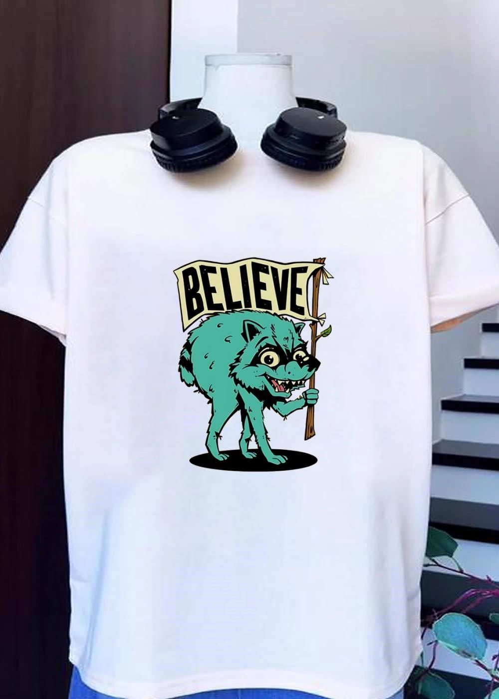 Believe Raccoon Carrying A Sign shirt
