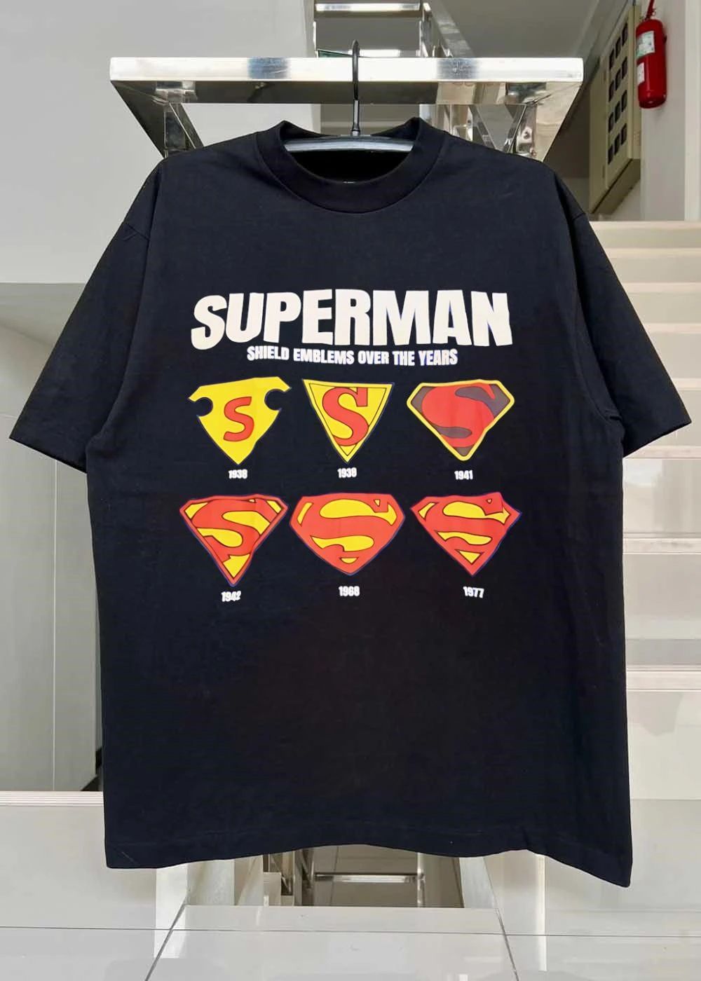 Shield Emblems Over the Years Superman T-Shirt