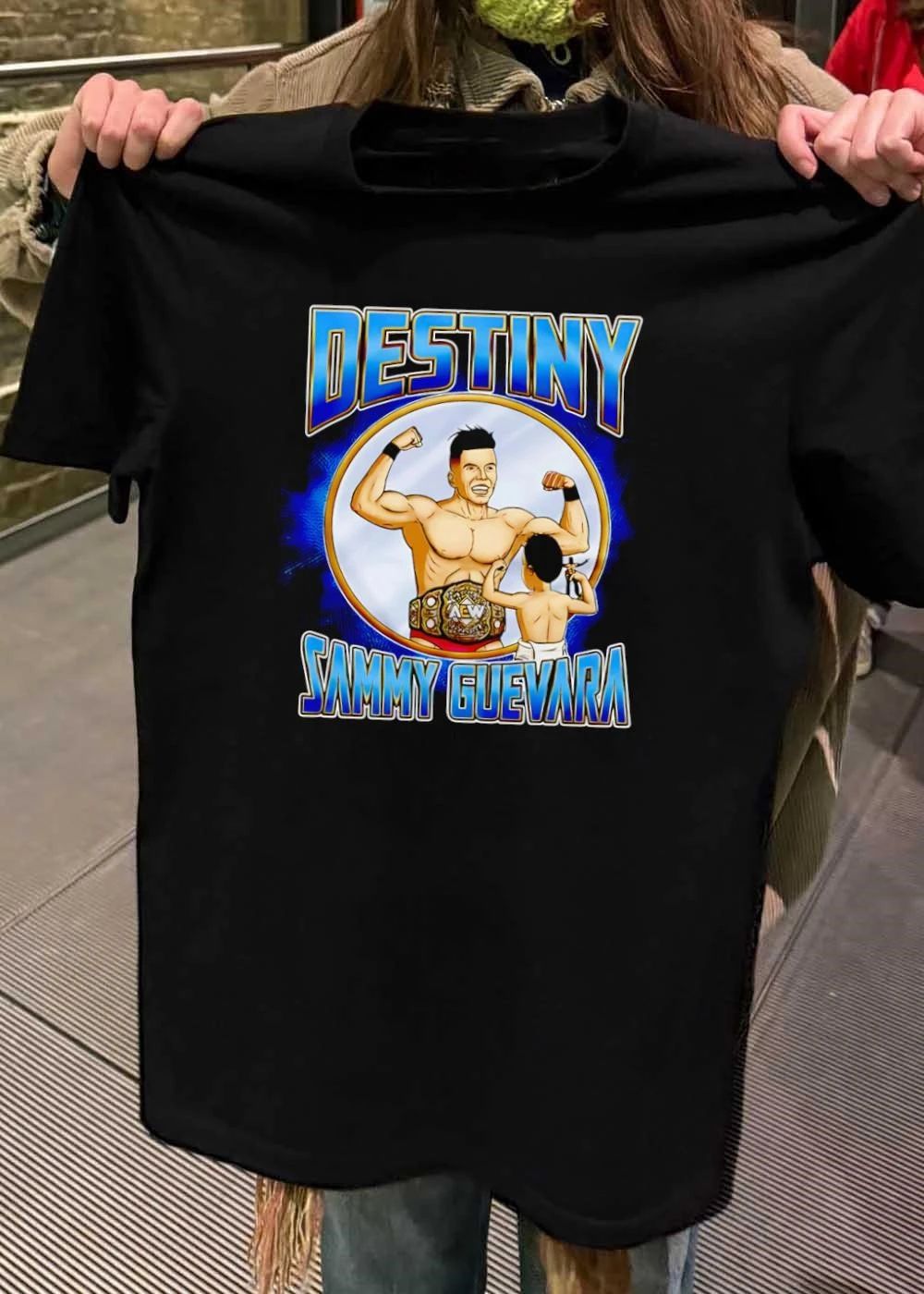 Destiny Sammy Guevara flexing with baby holding wrestling action figure shirt