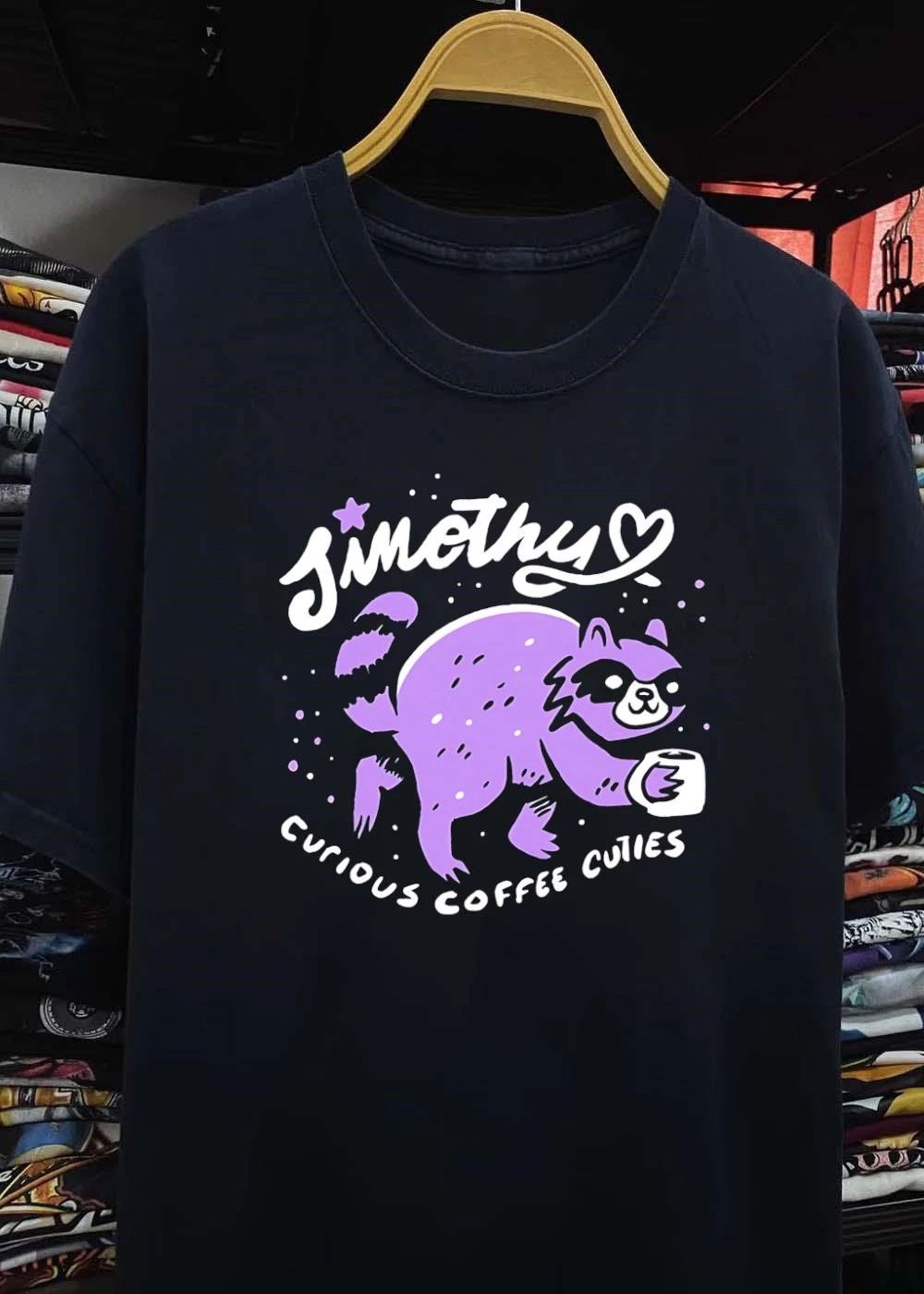 Curious Coffee Cuties Sinothy Raccoon Drinking Cup Shirt