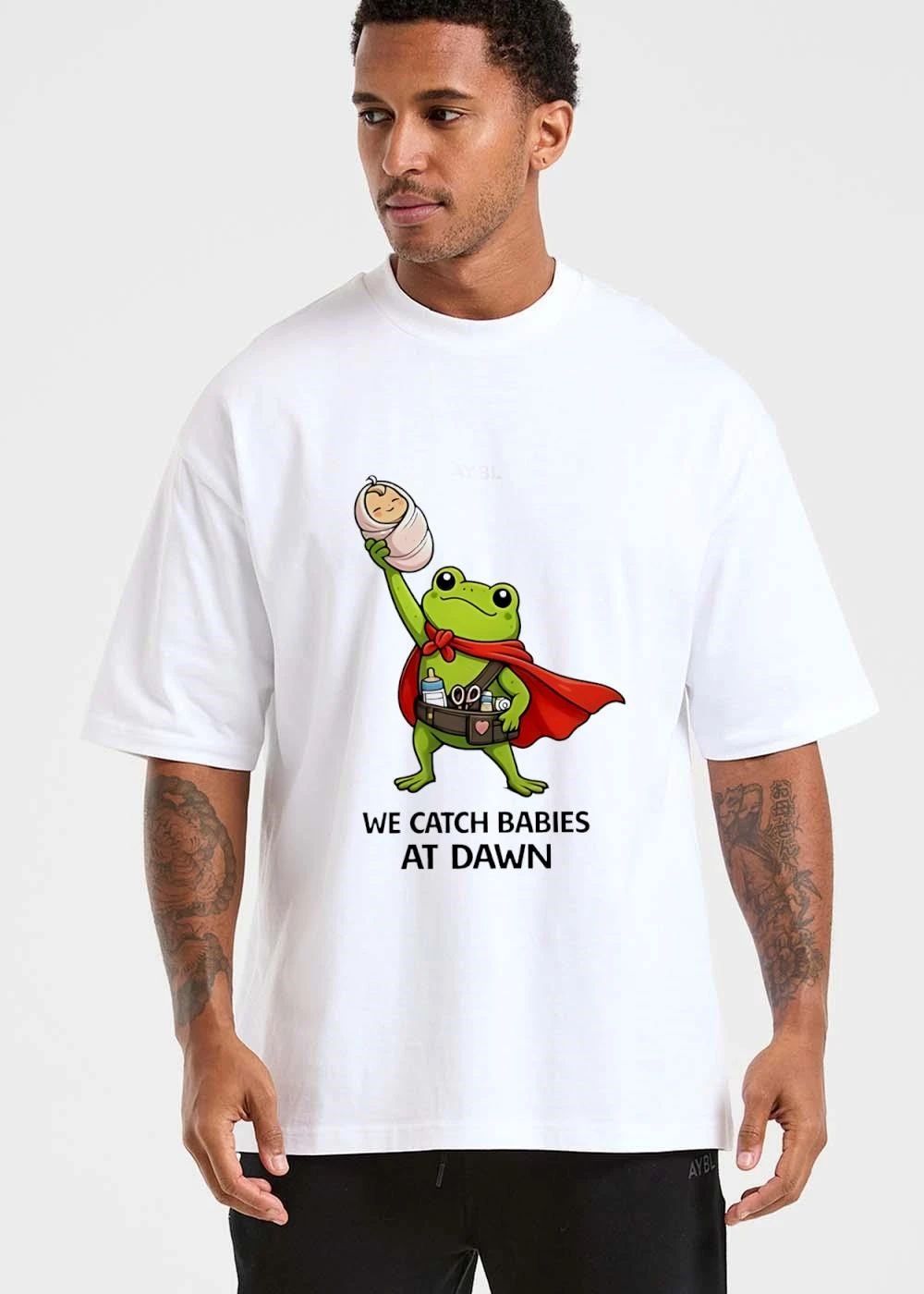 We Catch Babies At Dawn Cartoon Cape Frog Utility Belt Swaddled Infant shirt