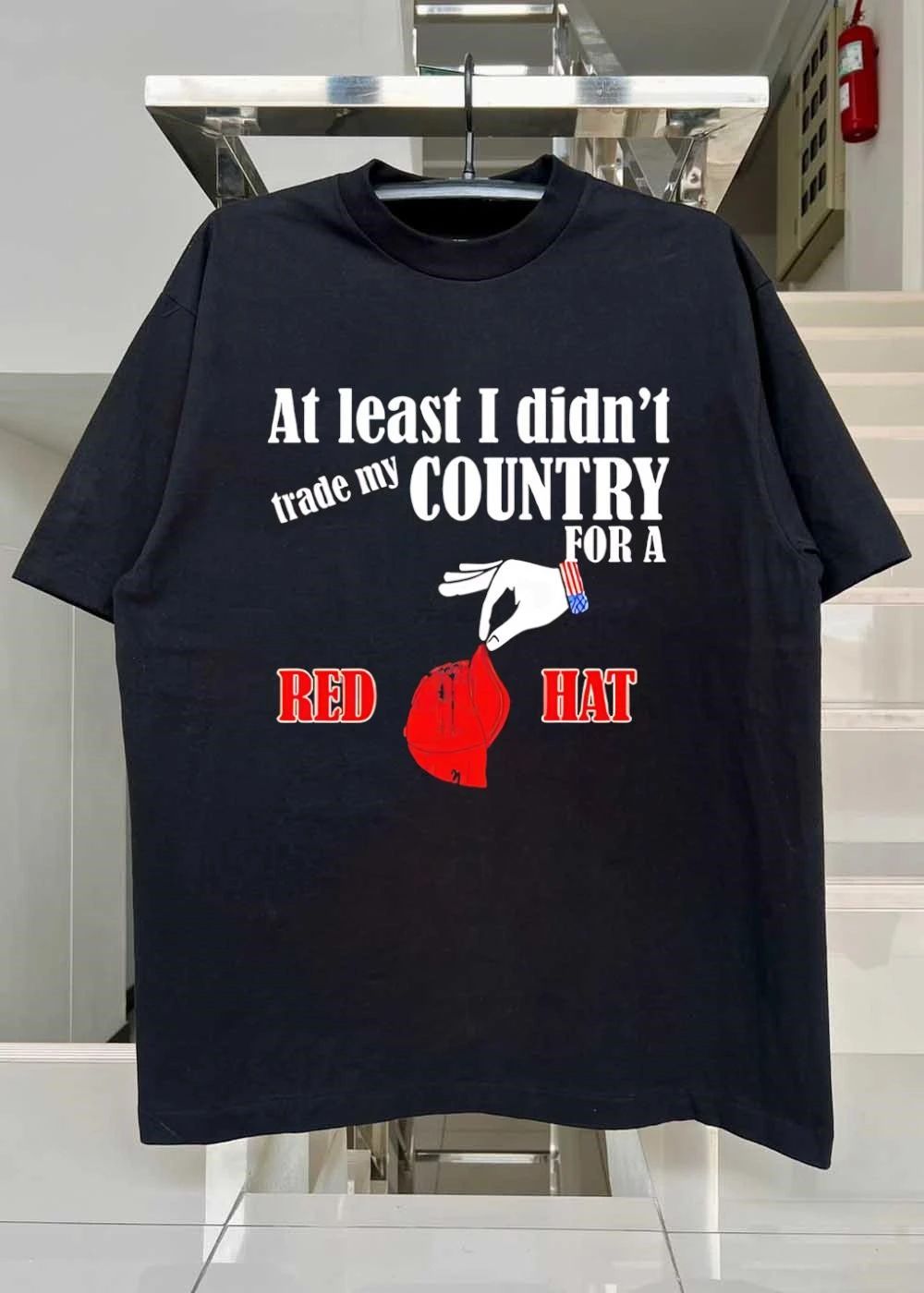 At Least I Didnt Trade My Country For A Red Hat Hand American Flag Cuff Dropping Baseball Cap shirt
