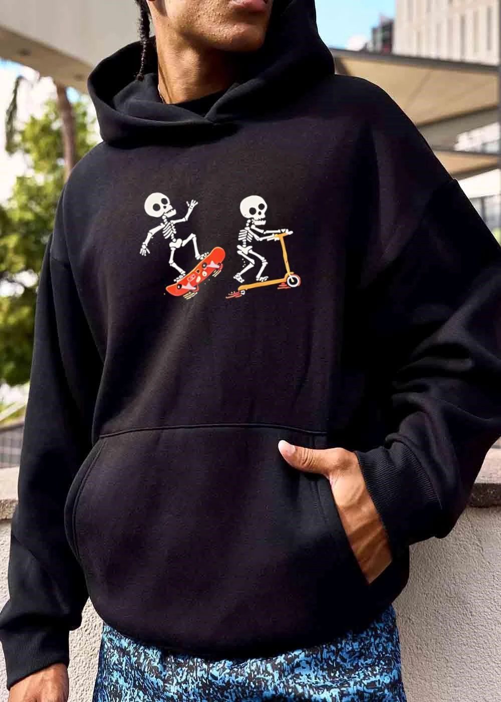Two Cartoon Skeletons Riding Orange Skateboard And Kick Scooter shirt