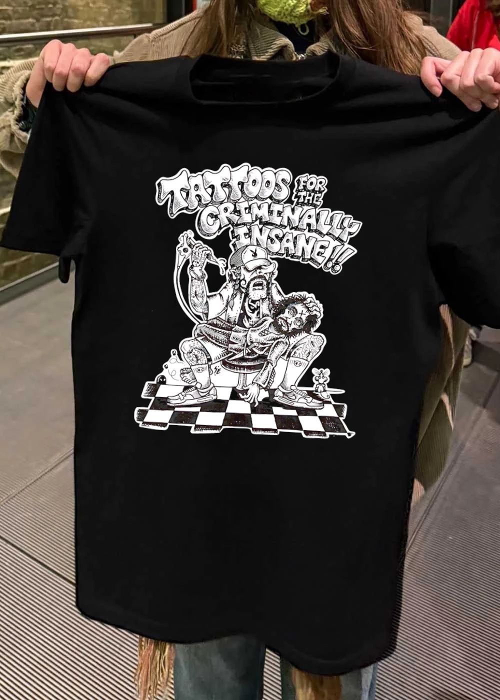Criminal Giving Tattoos to Man Tattoos for the Criminally Insane T-Shirt