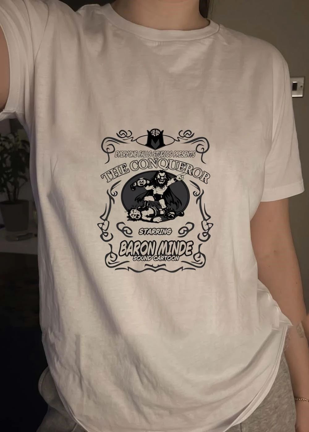 Everyone Falls Studios Presents The Conqueror Starring Baron Minde Sound Cartoon Shirt