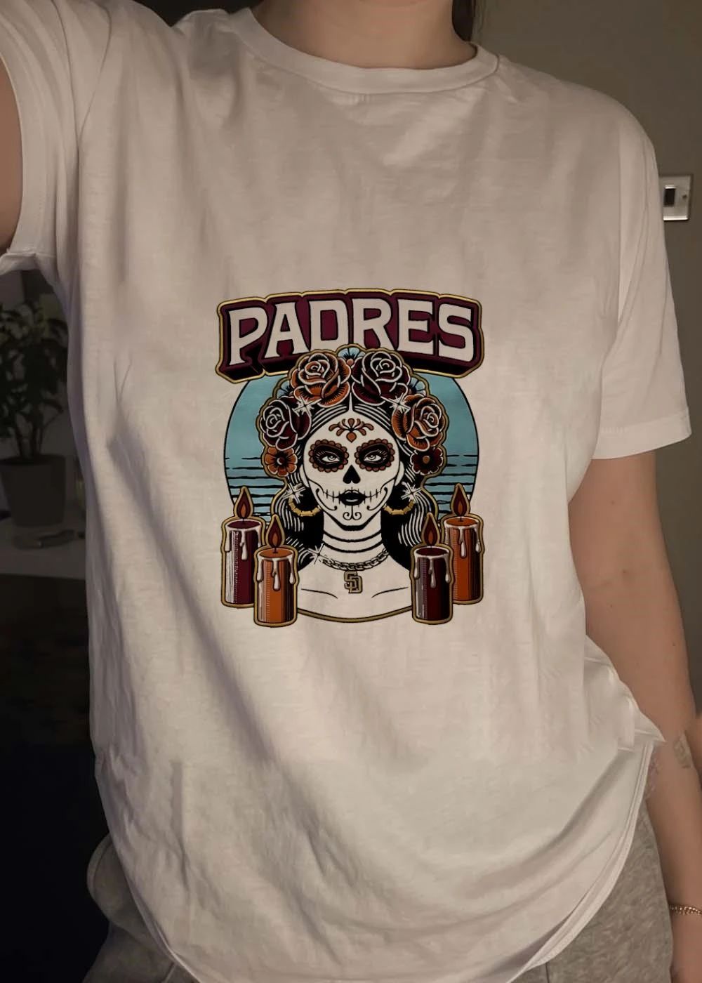 Sugar Skull Woman Wearing SD Pendant Candles Padres Shirt