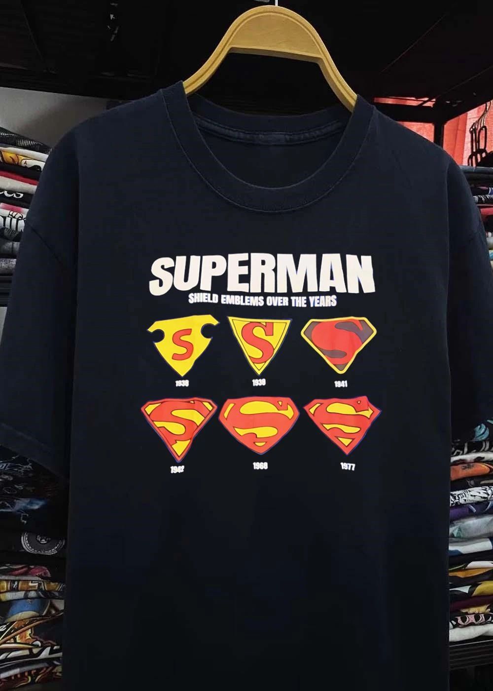 Shield Emblems Over the Years Superman T-Shirt